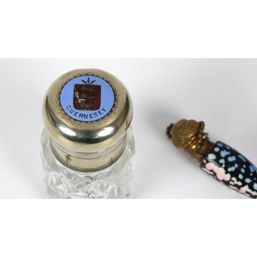 1428 - A cut glass scent bottle with white metal mount inset with an enamelled Guernsey doubles coin dated ... 