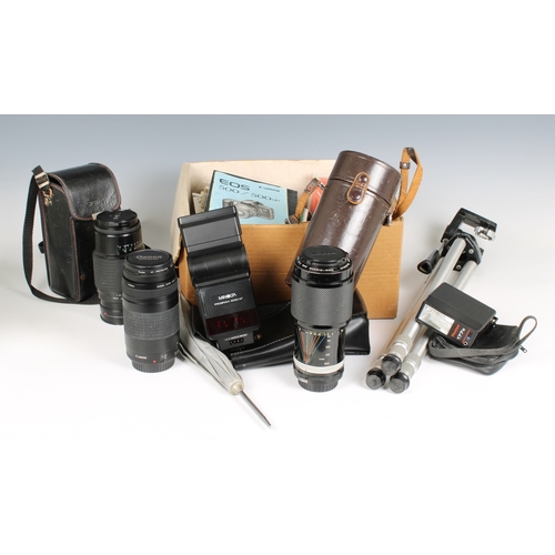 1445 - A collection of camera equipment comprisng a Nikon Nikkormat FT2 camera, Kodak Retina Reflex IV came... 