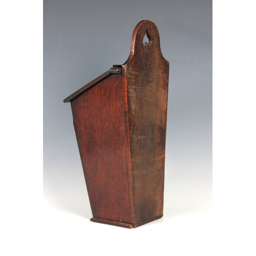 1449 - A 19th Century oak wall hanging candle box of typical form with sloping hinged lid, 41.3cm. high.