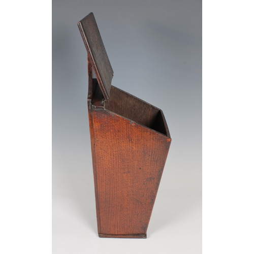 1449 - A 19th Century oak wall hanging candle box of typical form with sloping hinged lid, 41.3cm. high.