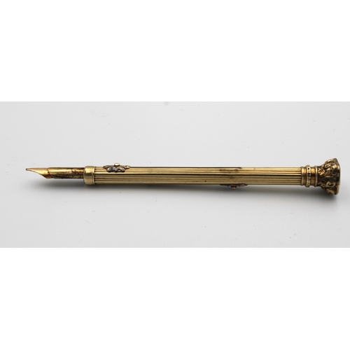 1454 - A Victorian yellow metal propelling pencil / pen combination of typical form with twin sliders and w... 