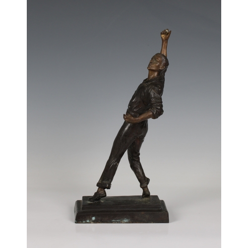 1456 - A cast bronze baseball player sculpture / model having ball in his left hand and right arm aloft, ra... 