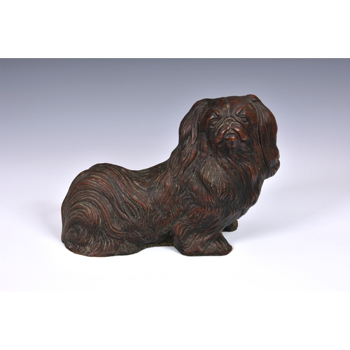 1459 - A Pekingese dog figure or doorstop 30.5cm. long.