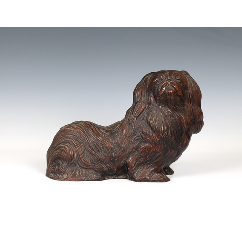 1459 - A Pekingese dog figure or doorstop 30.5cm. long.