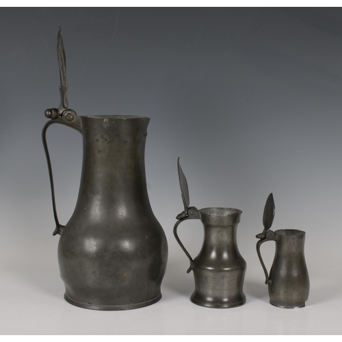 1464 - A Jersey 18th century pewter lidded flagon with twin acorn thumbpiece and impressed GR & crown, cont... 