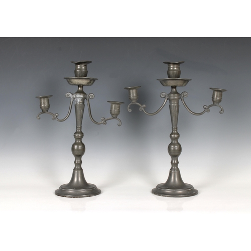 1465 - A pair of 19th century pewter twin branch candelabra with central sconce 38.1cm. high.