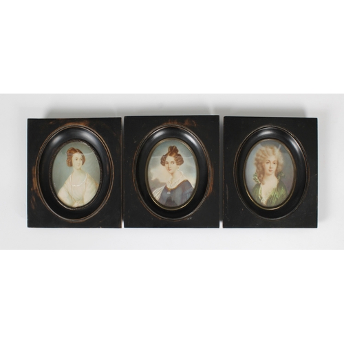 1469 - English School, early 19th century three oval miniatures of young women, two in matching early 19th ... 