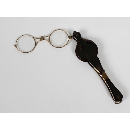 1470 - A French 19th century gold and tortoiseshell lorgnette 15.2cm. wide.