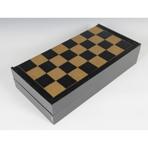 1480 - A 20th century oriental chess set contained within a black lacqered wooden box doubling as a chess b... 