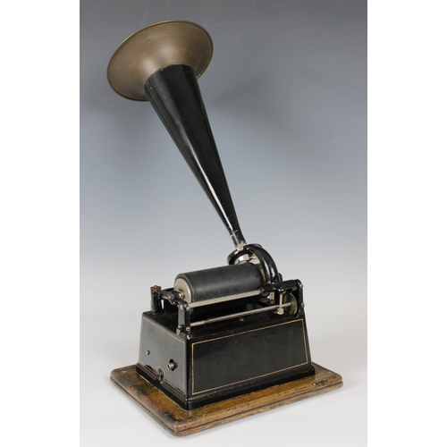 1500 - An Edison Gem phonograph with case and tin horn circa 1900, domed wooden case with handle inscribed ... 