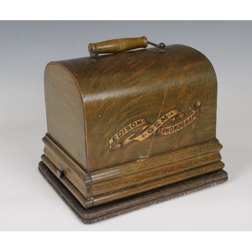 1500 - An Edison Gem phonograph with case and tin horn circa 1900, domed wooden case with handle inscribed ... 