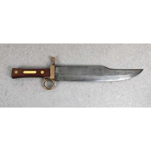 1532 - A heavy Civil War period Bowie Knife of large proportions with 11«in. steel blade, to later brass cr... 