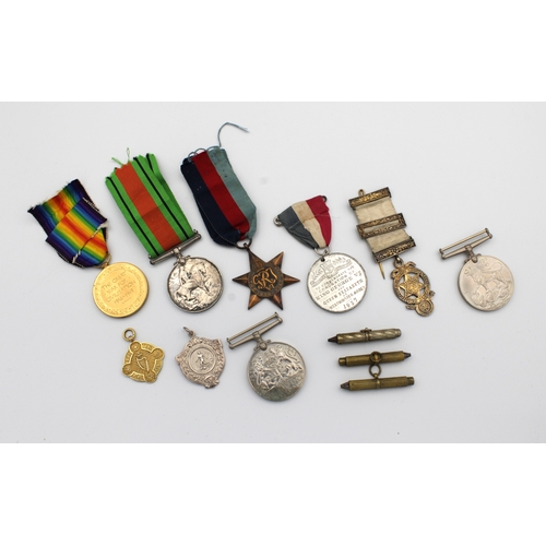 1544 - A collection of war medals etc to include a WWI RAF medal pair, War & Victory Medals, awarded to 130... 