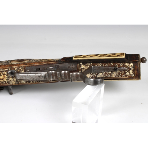 1545 - A scarce antique 17th Century Teschinke-Teschen Wheellock Rifle having slightly tapering 14mm cal. s... 