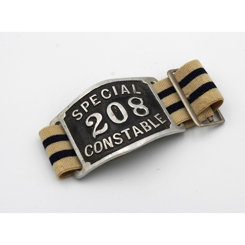 1553 - A WWI Special Constable armband, No. 208.