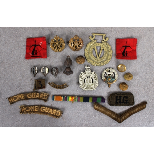 1558 - A collection of military badges comprising two RAF brass beret badges together with three RAF brass ... 