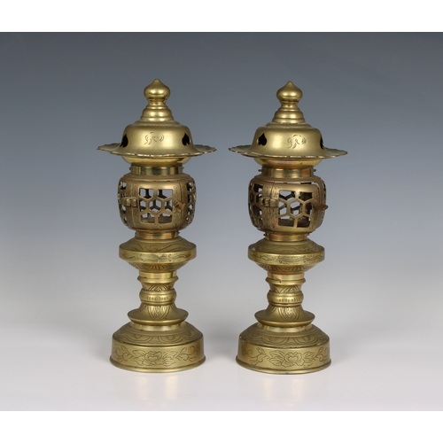 699 - A pair of Japanese style temple lamps / candle lamps having opening pierced galleries for tea lights... 