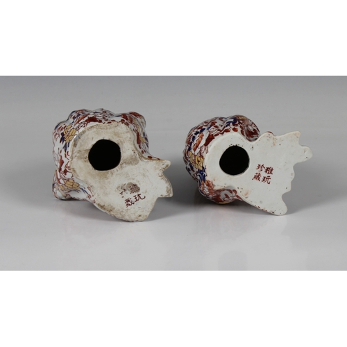 712 - A pair of Chinese Imari frogs signed,12.8cm. high. (2)