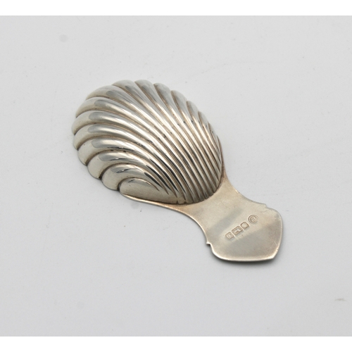 1032 - An Elizabeth III silver caddy spoon with shell-form bowl Francis Howard Ltd, Sheffield, 1978, 8cm. l... 