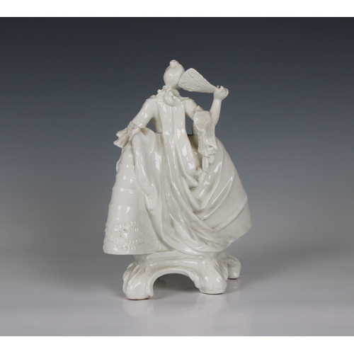 15 - A Nymphenburg white porcelain figure of a lady with a fan circa 1920, perhaps from a model by J.P.R.... 