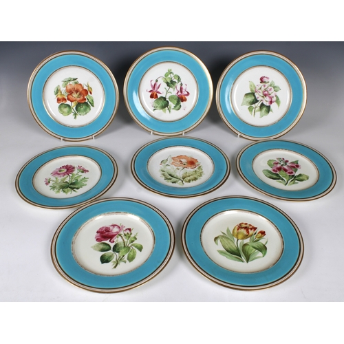 18 - Eleven English, early 20th century, porcelain botanical dessert plates each with a turquoise border ... 