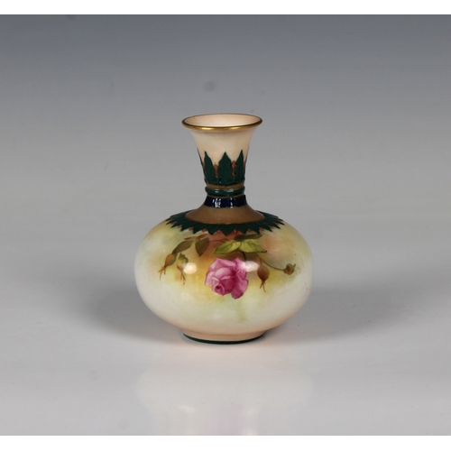 27 - A Royal Worcester porcelain bulbous bud vase hand painted with sprays of roses and gilded highlights... 