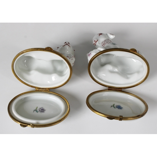 29 - A pair of Porcelain de Paris gilt metal mounted porcelain boxes in the form of a lion and a lamb, po... 