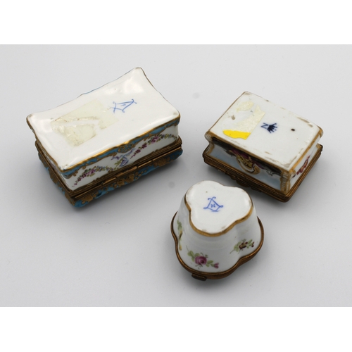 5 - Three porcelain trinket boxes including a Capodimonte example with relief moulded decoration, with N... 