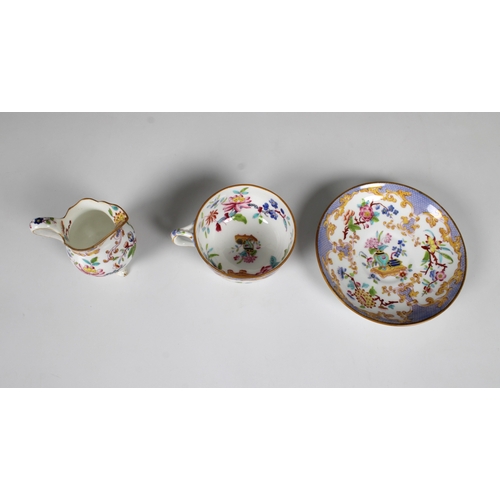 55 - A 19th century Minton porcelain tea cup and saucer with milk jug profusely decorated with flowers, f... 