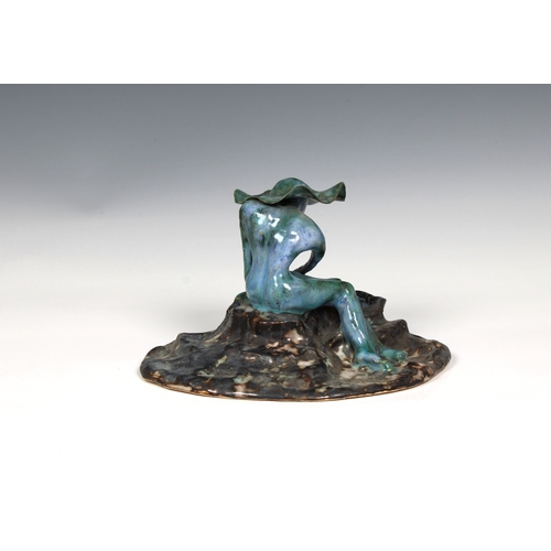 78 - Guernsey Studio pottery - Elizabeth Ann Macphail (1939-89) A turquoise glazed stylised female figure... 