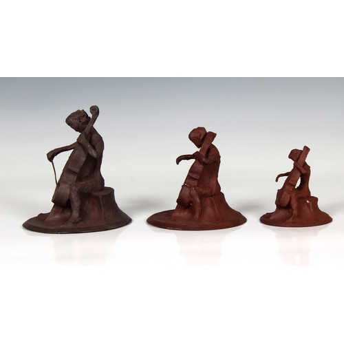 94 - Guernsey Studio pottery - Elizabeth Ann Macphail (1939-89) Three small unglazed cellist or double ba... 