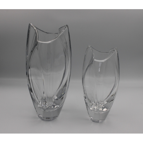 126 - Two clear glass graduated Baccarat 'Giverney' pattern vases marked 'R Rigot' and 'Baccarat France', ... 