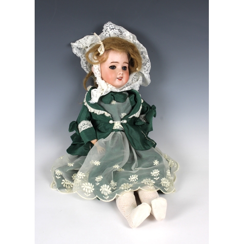 149 - A French SFBJ (Socit Franaise de Fabrication de Bbs et Jouets) bisque head doll with blue sleep... 