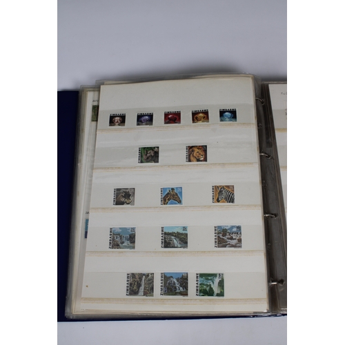 157 - Philately interest - Stamp binder Rhodesia 1905-1983, to include set of six 1905 opening of Victoria... 