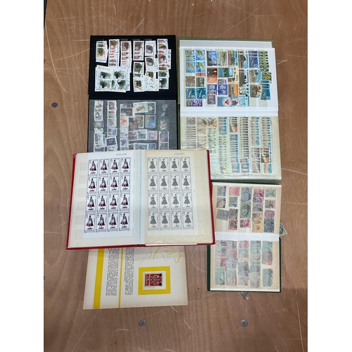 183 - Philately interest - A large collection of mixed Worldwide used stamps housed in twelve small stock ... 