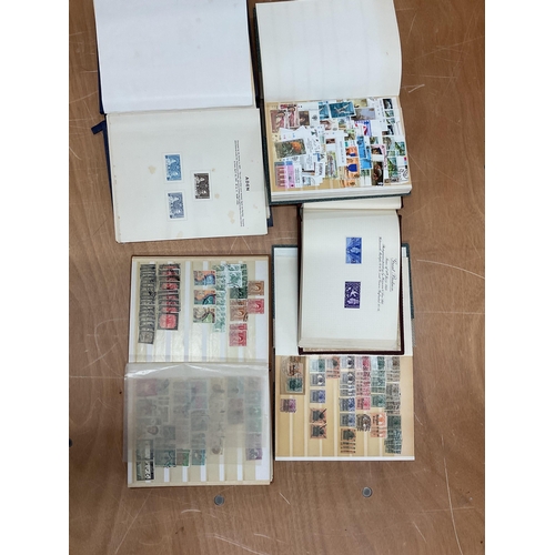 183 - Philately interest - A large collection of mixed Worldwide used stamps housed in twelve small stock ... 