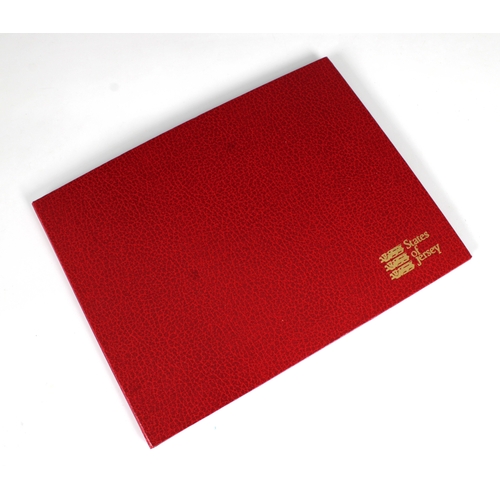 238 - A set of twelve parishes of Jersey 1 proof coins each in a perspex capsule, contained within a red ... 