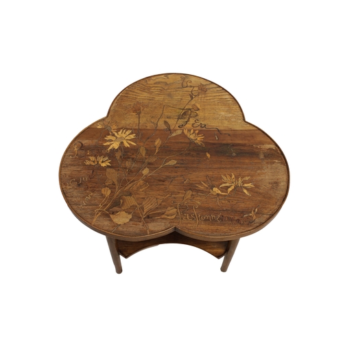 129 - An Emile Galle marquetry inlaid occasional tableSigned ?Galle a Nancy, bears original gallery label,... 