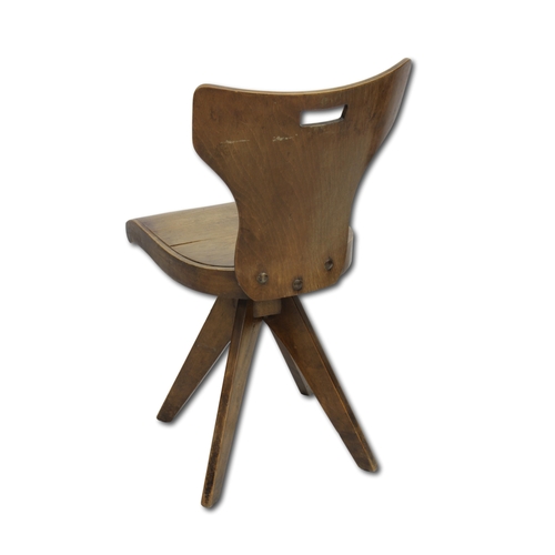 137 - A 20th Century German Bauhaus style chairthe swivel seat upon a single column splitting into four sp... 