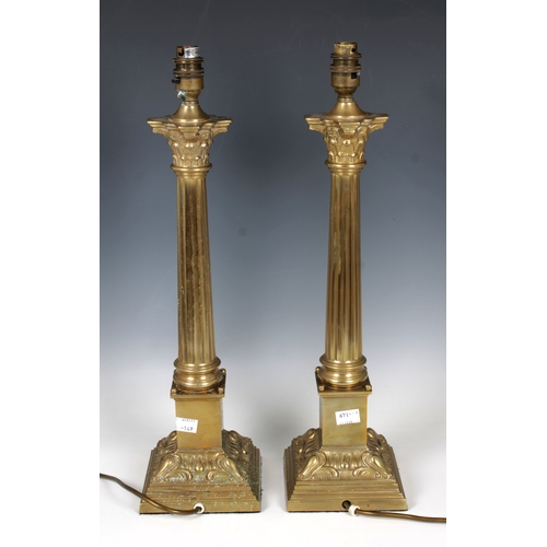 156 - A pair of 20th century brass table lampswith fluted Corinthian column bases, cream and burgundy plea... 