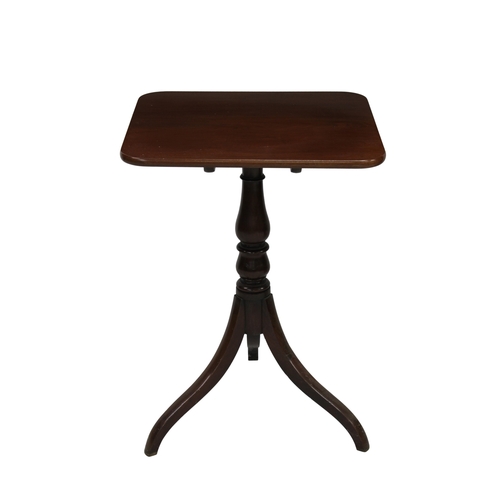 169 - A late 19th century mahogany occasional tablewith a rectangulr top above a turned support on three l... 