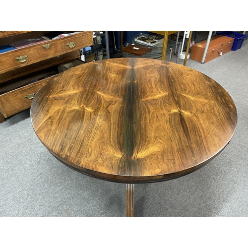 170 - A George IV rosewood breakfast table with a circular topthe central pedestal raised on three reeded ... 