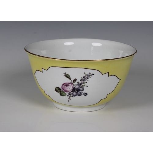 24 - A porcelain yellow-ground footed bowlprobably Meissen, painted floral bouquets within cartouches, gi... 