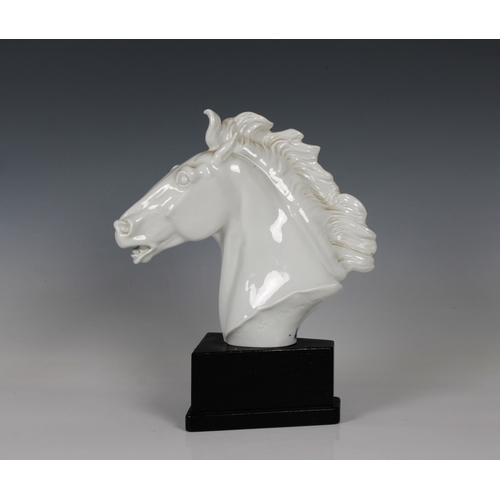 25 - A Meissen white glazed porcelain horse head bustsigned 'ERICH OEHME 1949', blue crossed sword mark, ... 