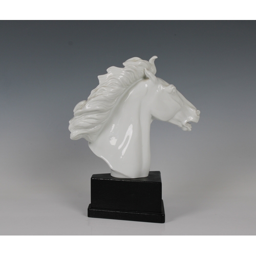 25 - A Meissen white glazed porcelain horse head bustsigned 'ERICH OEHME 1949', blue crossed sword mark, ... 