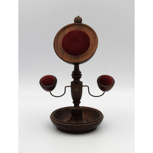 51 - A Modern Rosewood Pocket Watch Stand, pin cushion, ring holder by Mike Fitz18cm. high.