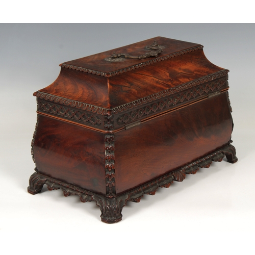 68 - A kingwood bureau platIn the Louis XV style, the shaped rectangular top inset with leather, with thr... 