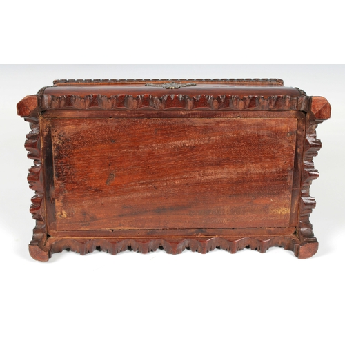 69 - A George II mahogany tea caddyof bombe sarcophagus form with foliate bracket feet, the interior late... 