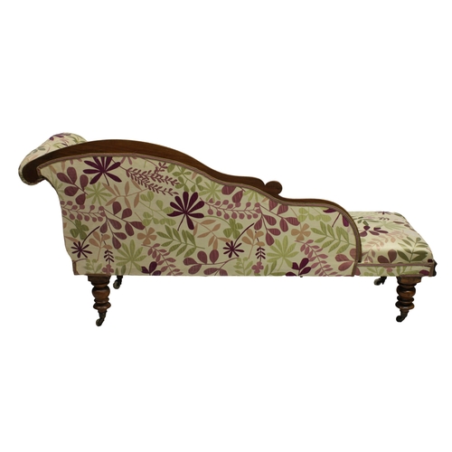 224 - A Victorian mahogany chaise longuescroll detail, button back silk floral fabric, turned supports, ce... 