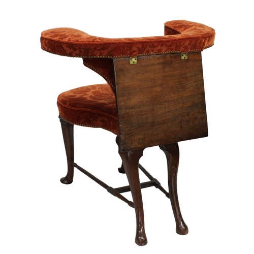 239 - A George II mahogany reading or cockfighting armchairthe U-shaped upholstered back and seat covered ... 